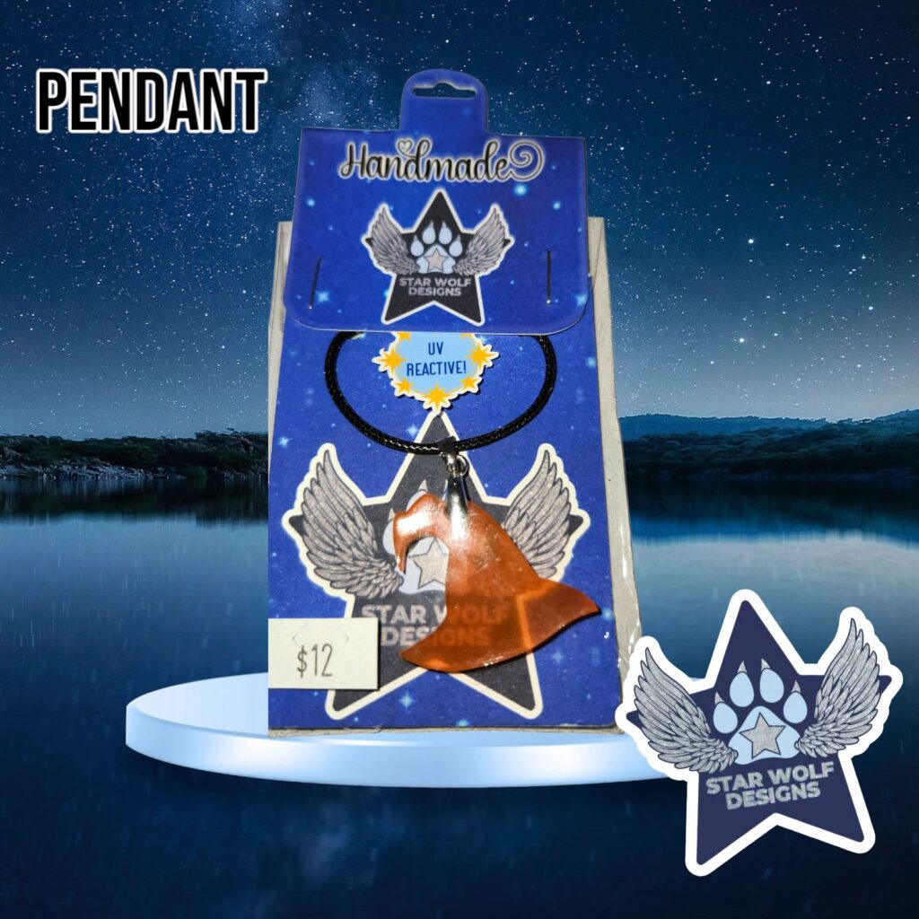 Orange pendant on a Star Wolf Designs card