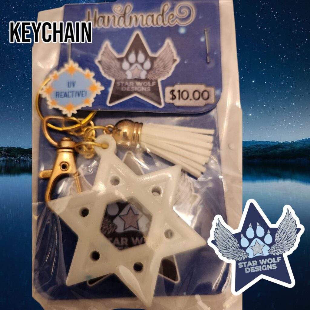 White six-pointed star keychain with a tassel