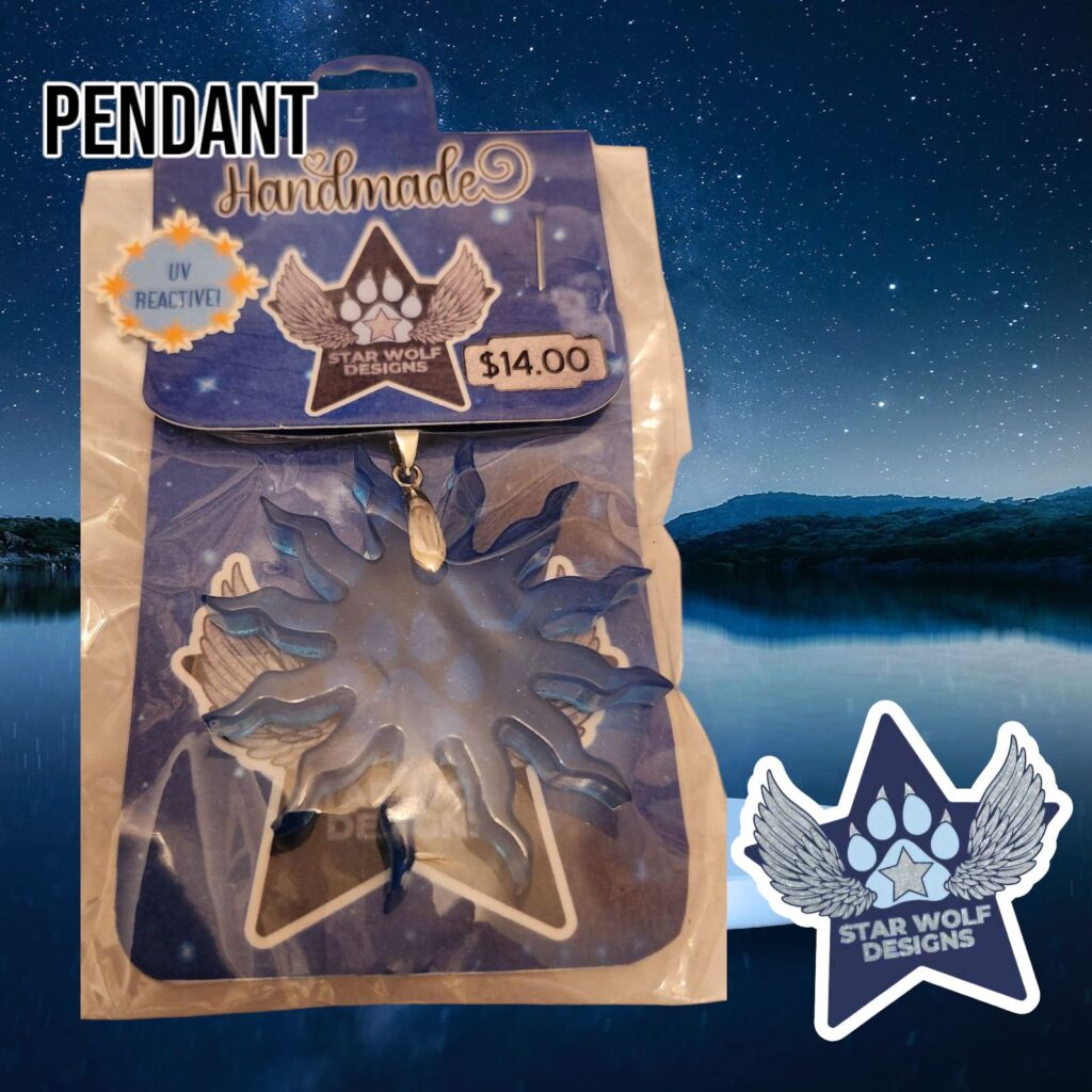 Tan pendant on a Star Wolf Designs card