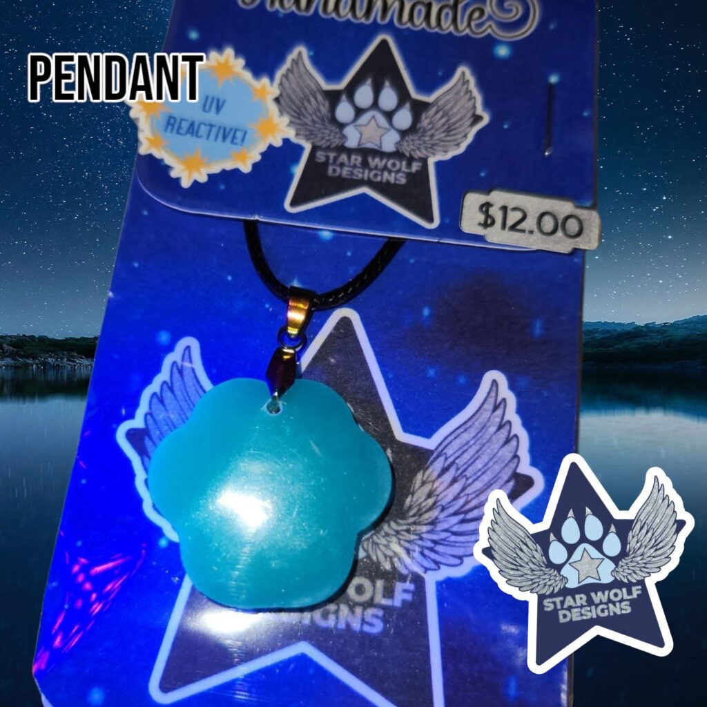 Teal pendant glowing under UV light